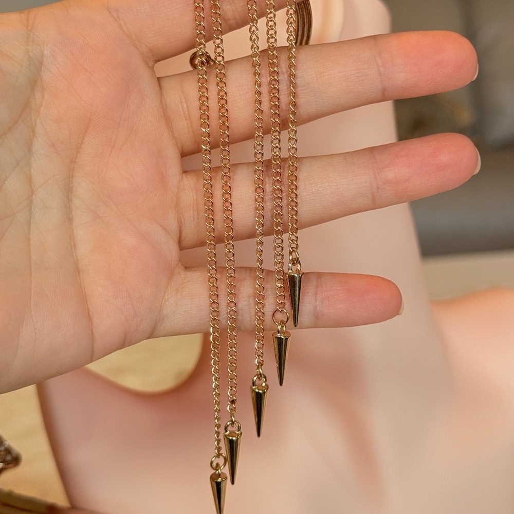 Elegant Gold Tassel Earrings - Picture 4 of 11